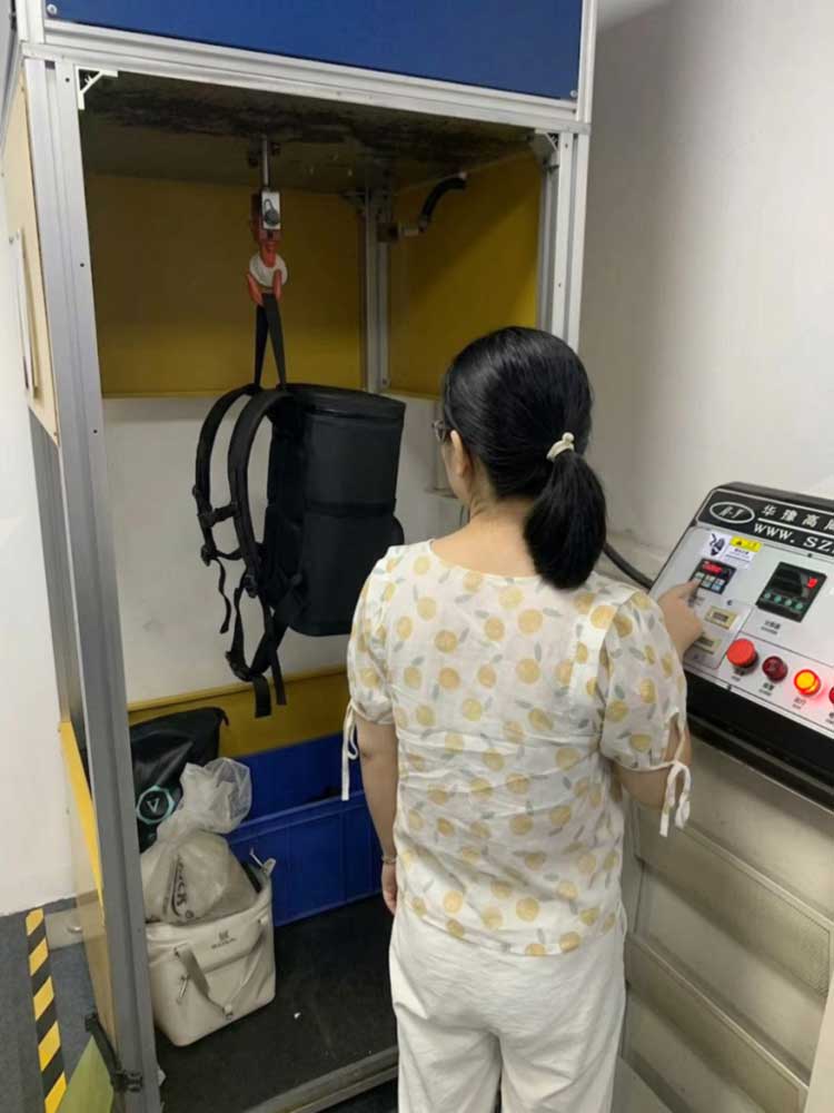 group camping cooler backpack overload strap test with IPX7 immersion and zipper cycle testing